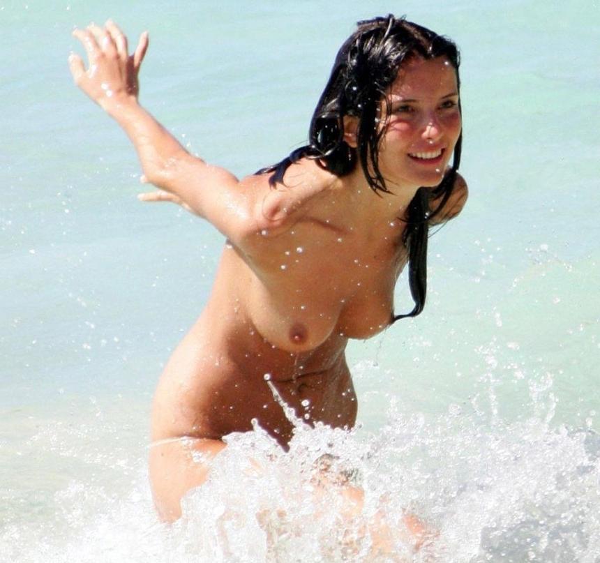 15P Blonde nudist strips down naked at a public beach