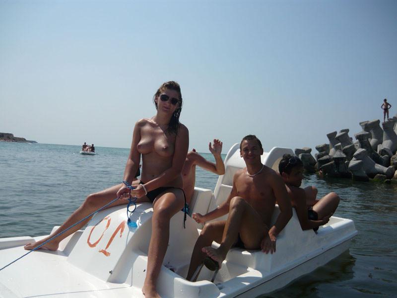 15P Nudist girls have fun with each other at the beach