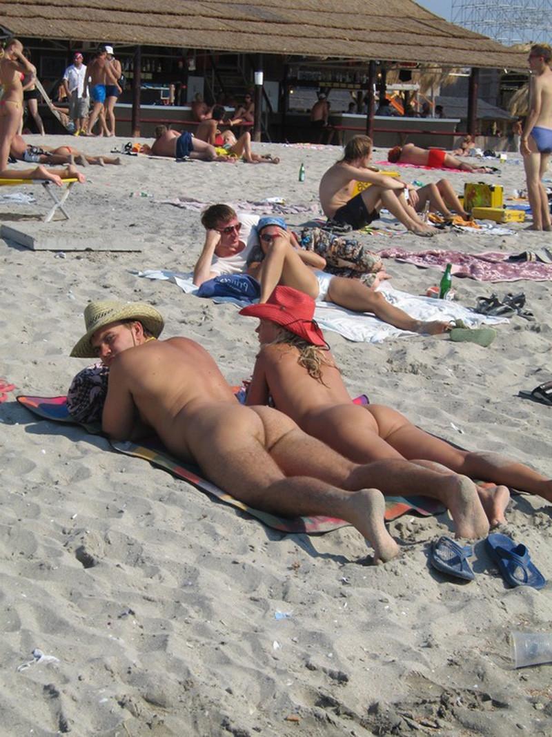 15P Brunette has some fun being nude on a public beach