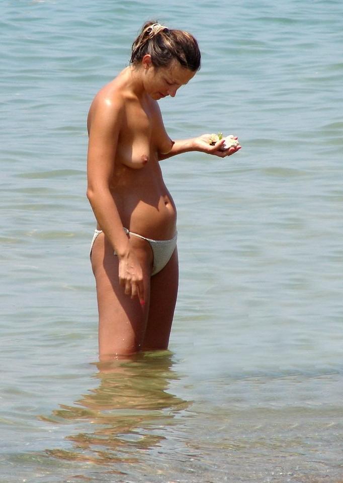 15P Sexy naked teens play together at a public beach