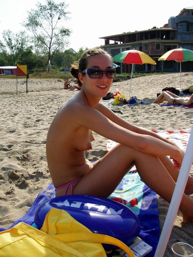 15P Barely legal nudist beach teen tans her whole body