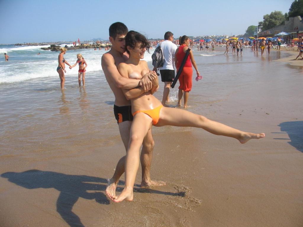 15P Barely legal nudist beach teen tans her whole body
