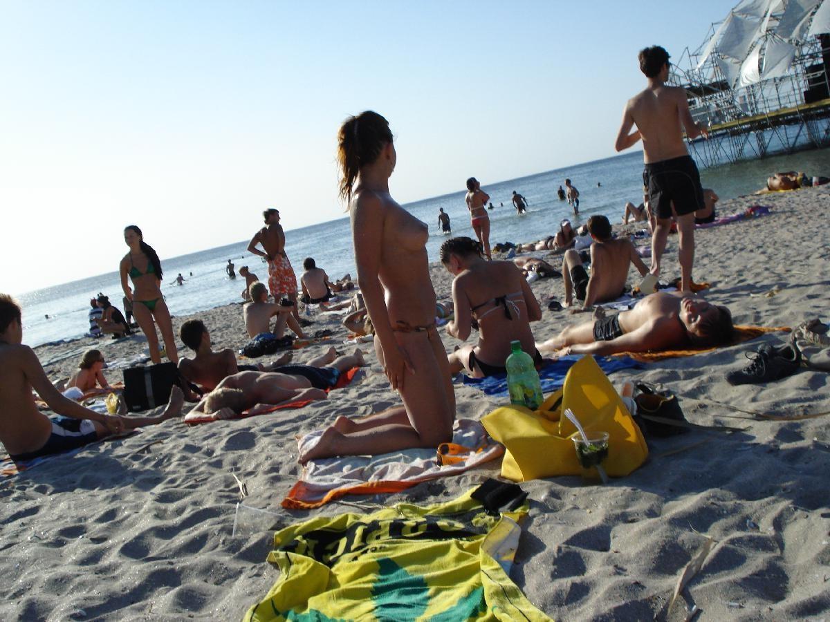 15P Barely legal nudist beach teen tans her whole body
