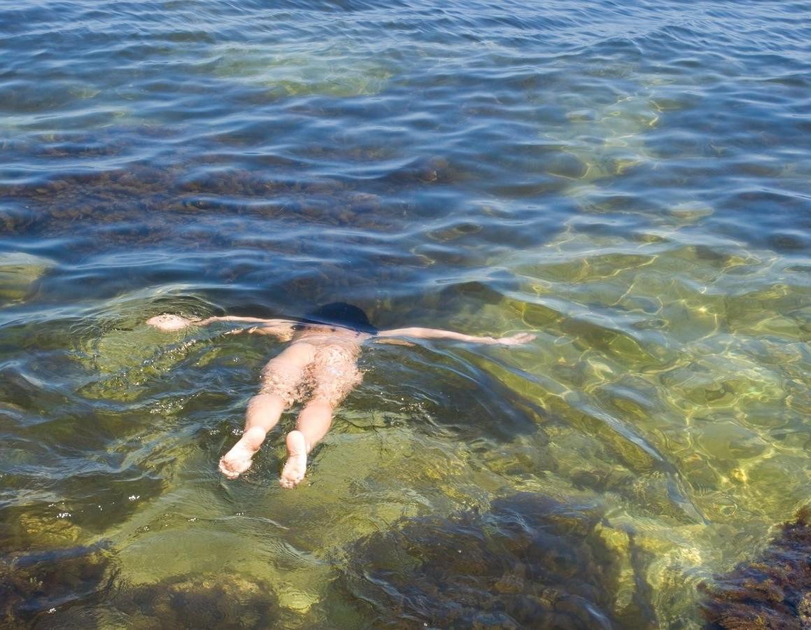 15P Barely legal nudist beach teen tans her whole body