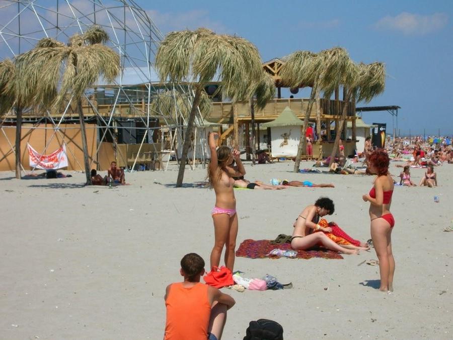 15P Barely legal nudist beach teen tans her whole body