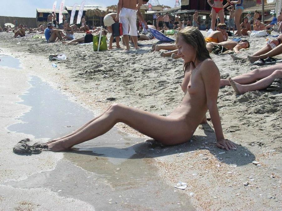 15P Barely legal nudist beach teen tans her whole body
