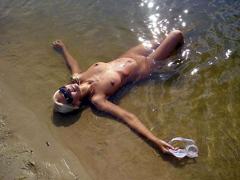 15P A public beach heats up with two hot teen nudists