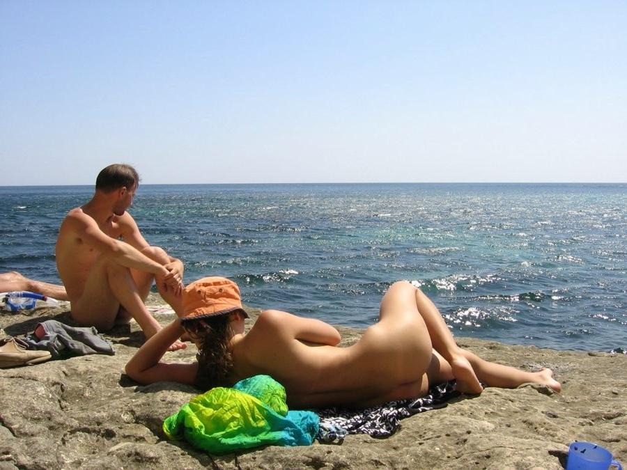 15P At the nudist beach teen girls play around naked