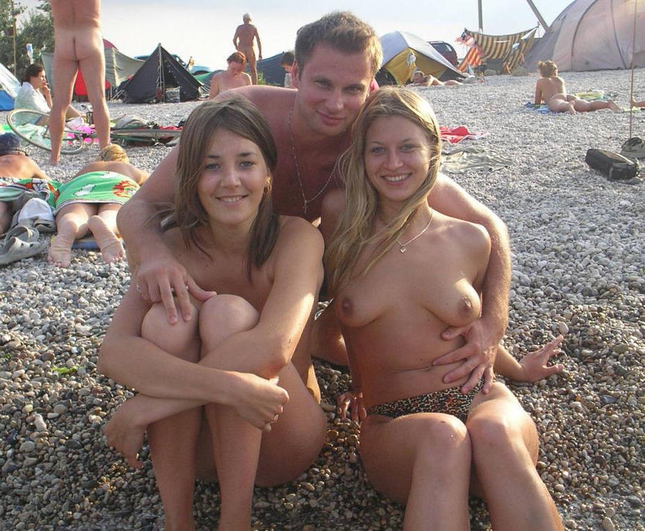 15P At the nudist beach teen girls play around naked