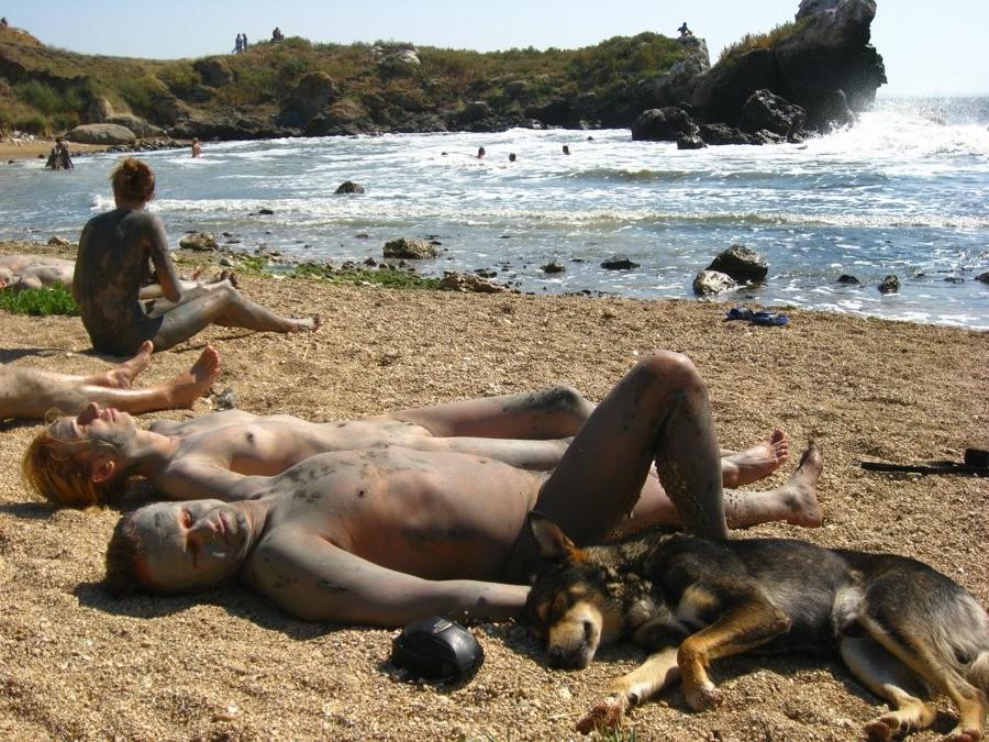15P Friendly young Russian nudists lay on the beach