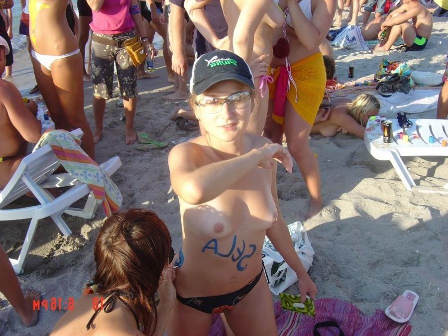 15P Friendly young Russian nudists lay on the beach