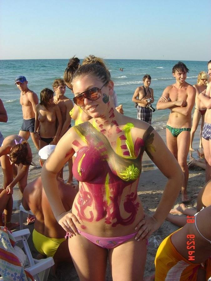 15P Friendly young Russian nudists lay on the beach