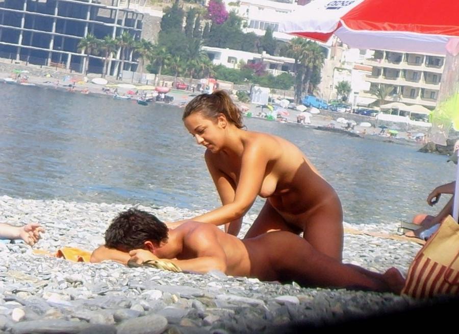 15P Blonde milf has some fun being nude on a public beach