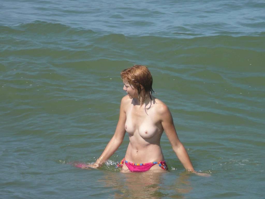 15P Having fun is easy at the beach for two nude girls