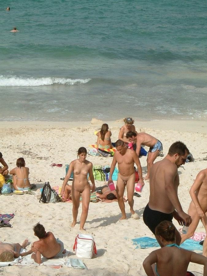 15P Having fun is easy at the beach for two nude girls
