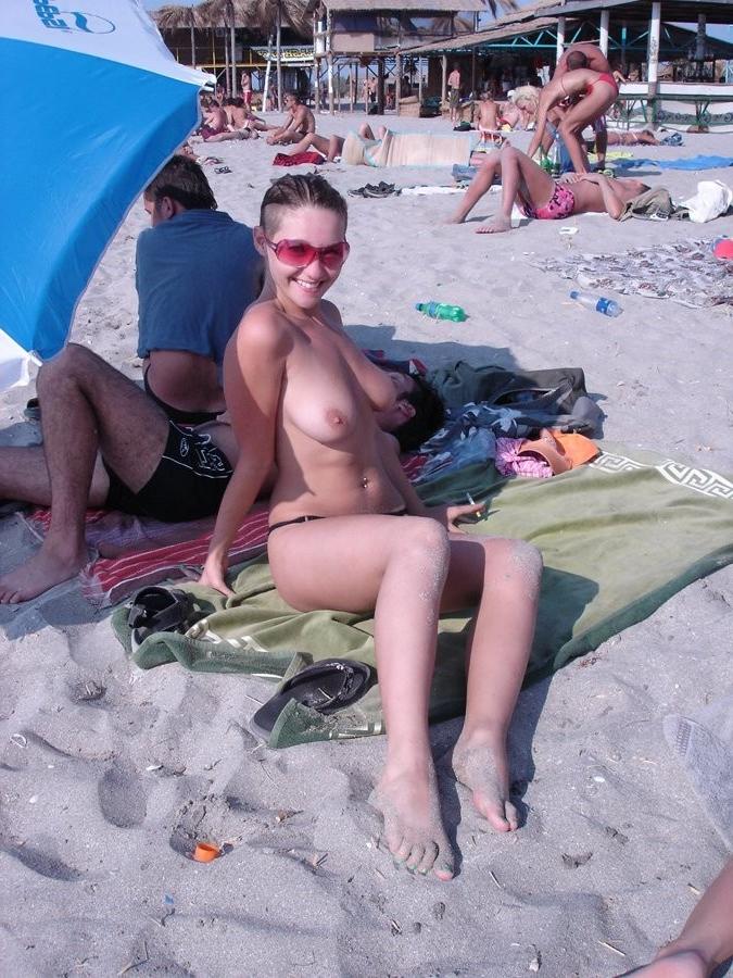 15P Having fun is easy at the beach for two nude girls