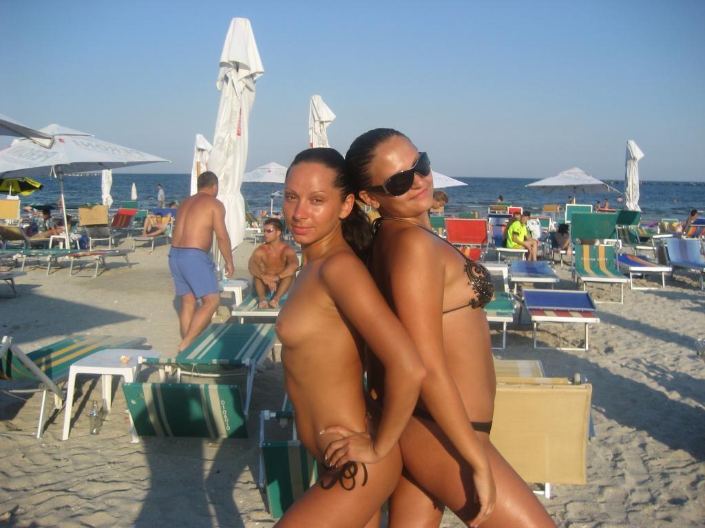 15P Barely legal young nudist lays naked at the beach
