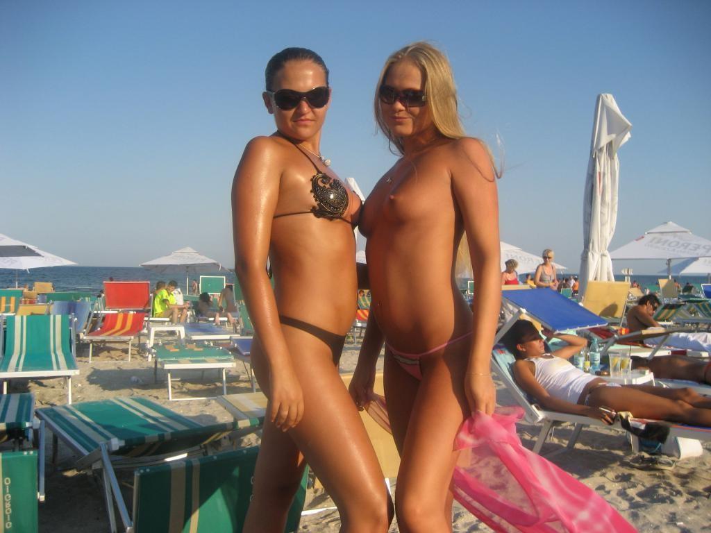 15P Barely legal young nudist lays naked at the beach