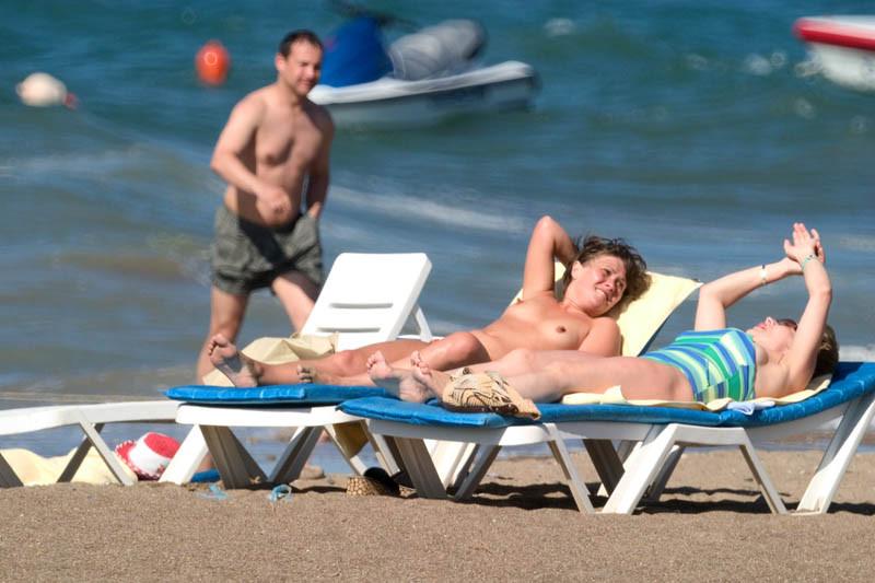 15P Sexy naked teens play together at a public beach