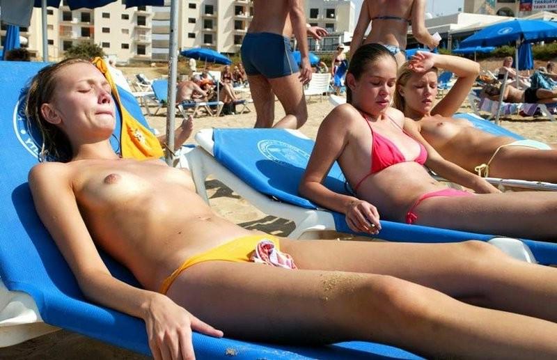 15P A public beach heats up with two hot teen nudists