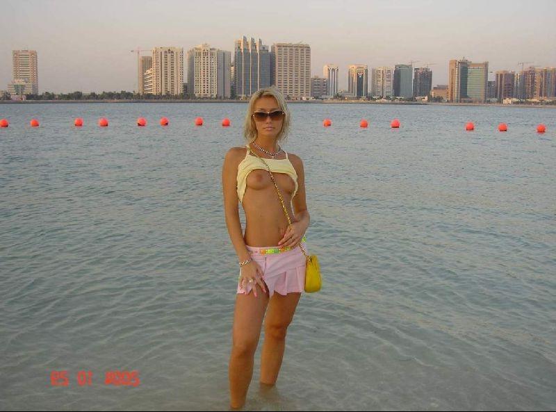 15P Nude teen friends play around at a public beach
