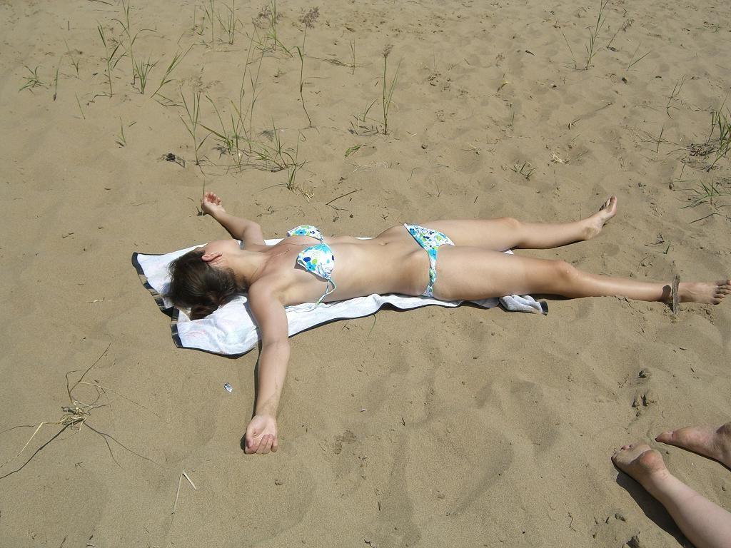 15P Busty blonde shows her naked body at the nude beach