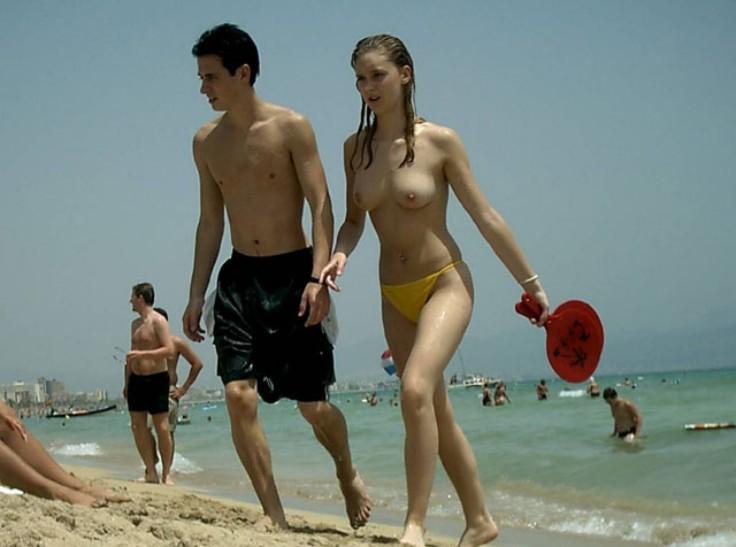 15P Busty blonde shows her naked body at the nude beach