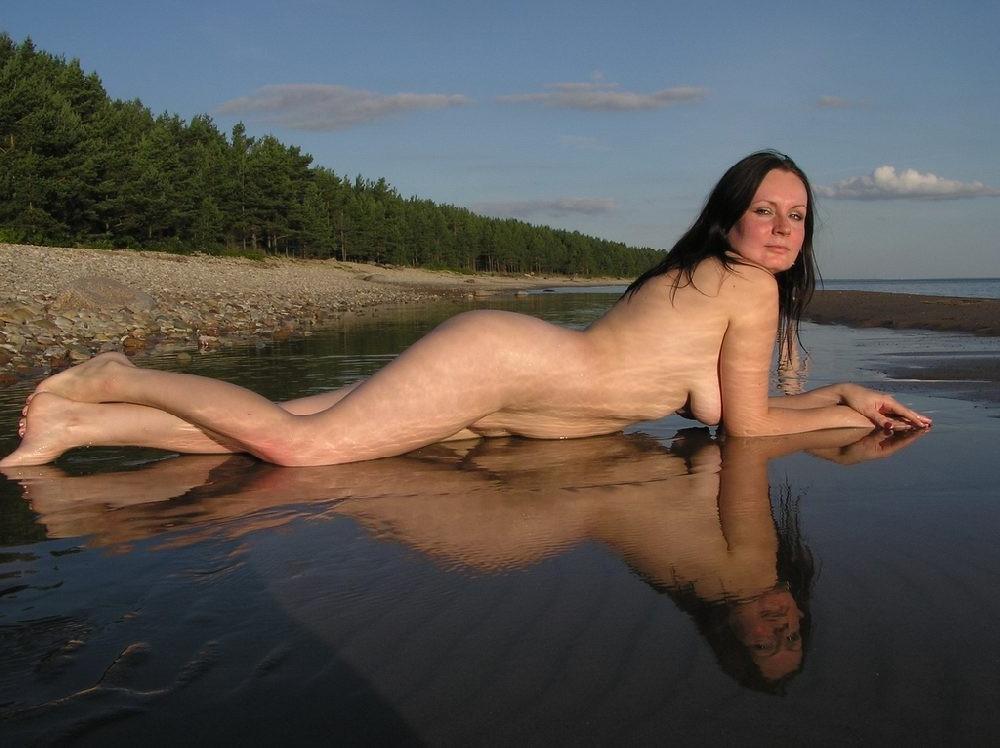 15P Friendly young Russian nudists lay on the beach