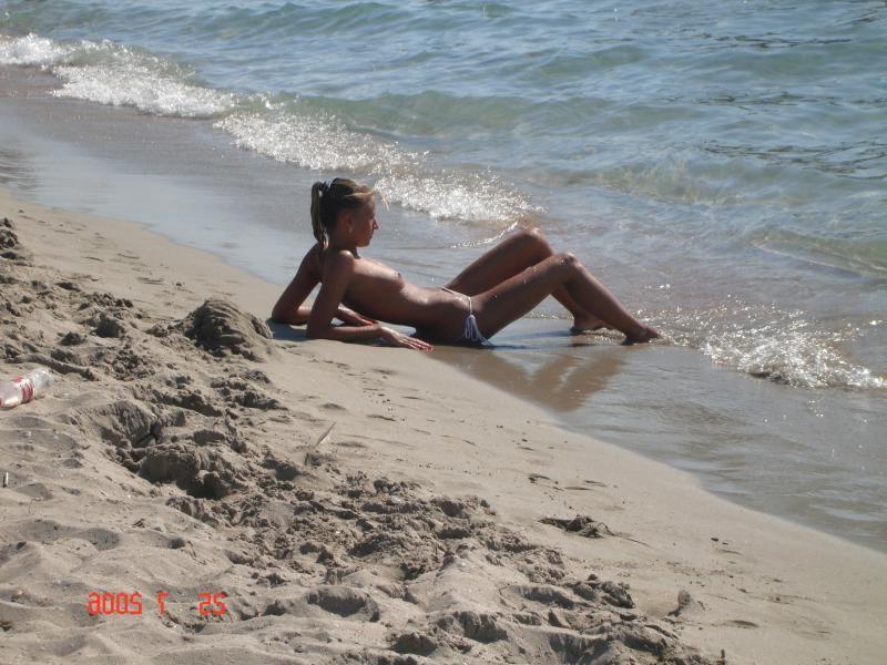 15P A public beach heats up with two hot teen nudists