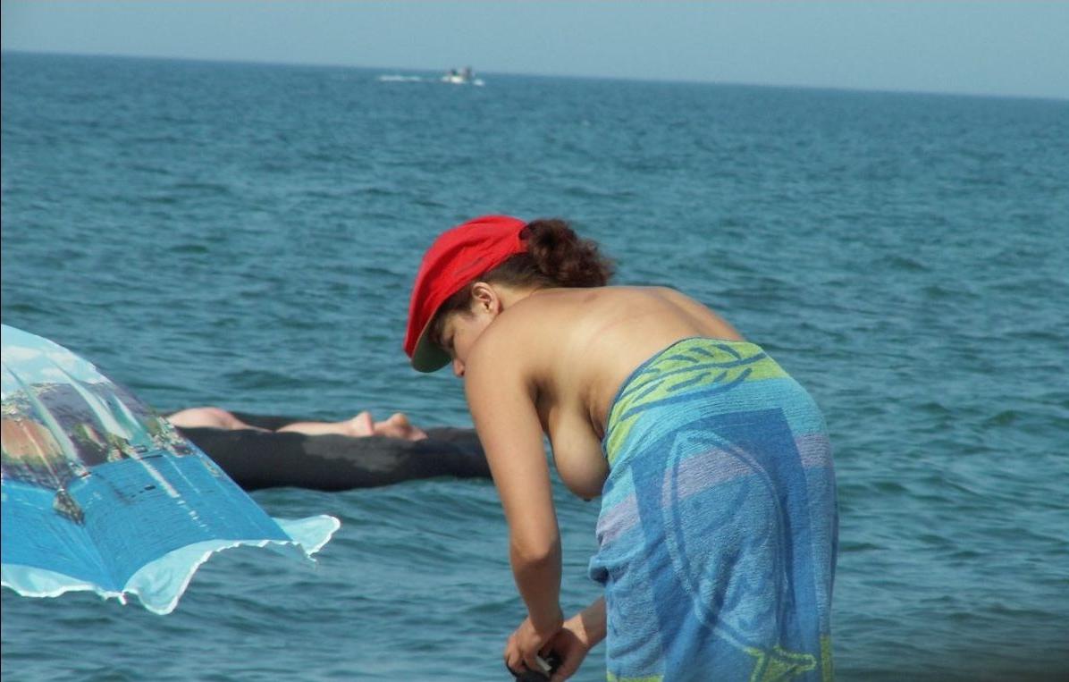 15P A public beach heats up with two hot teen nudists