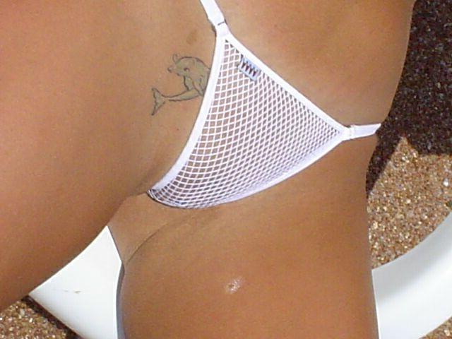 15P Slim teen with perky boobs naked at a nudist beach