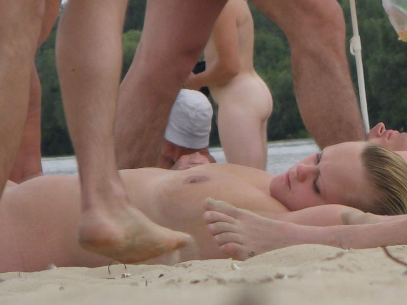 15P Slim teen with perky boobs naked at a nudist beach