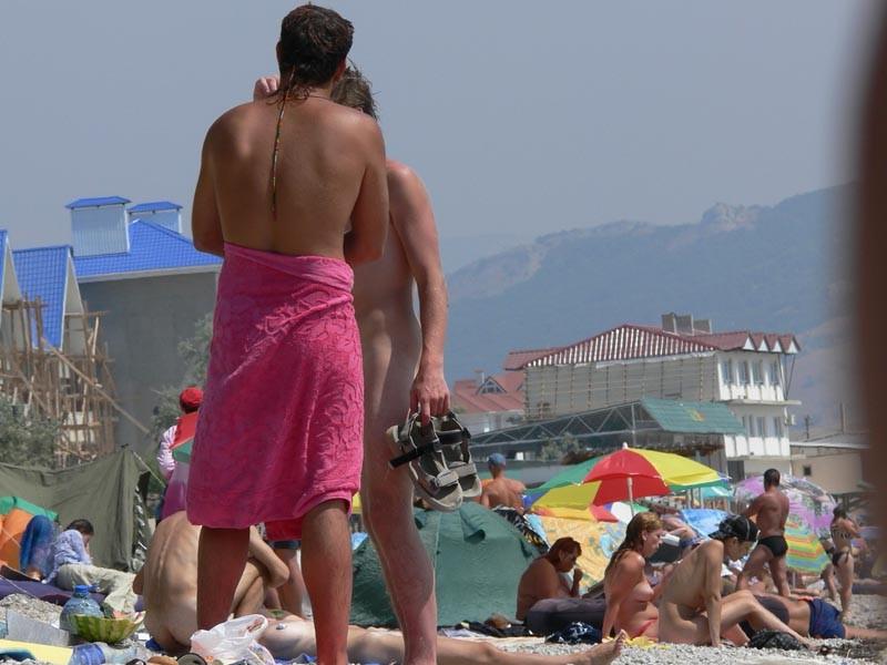 15P Barely legal young nudist lays naked at the beach
