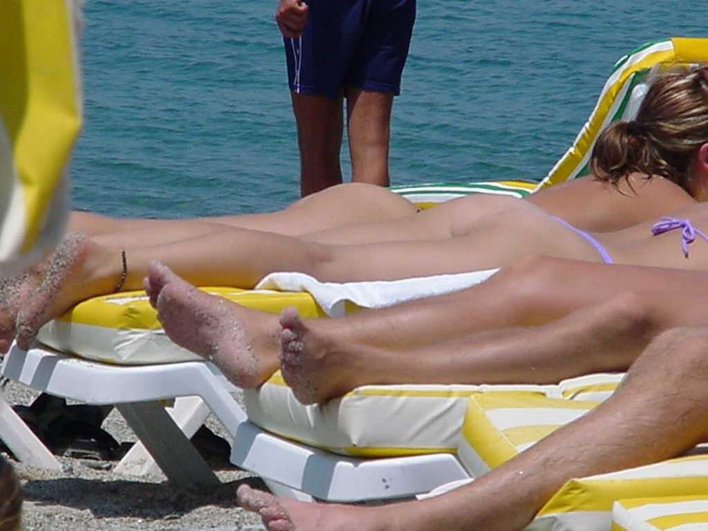 15P Busty blonde shows her naked body at the nude beach