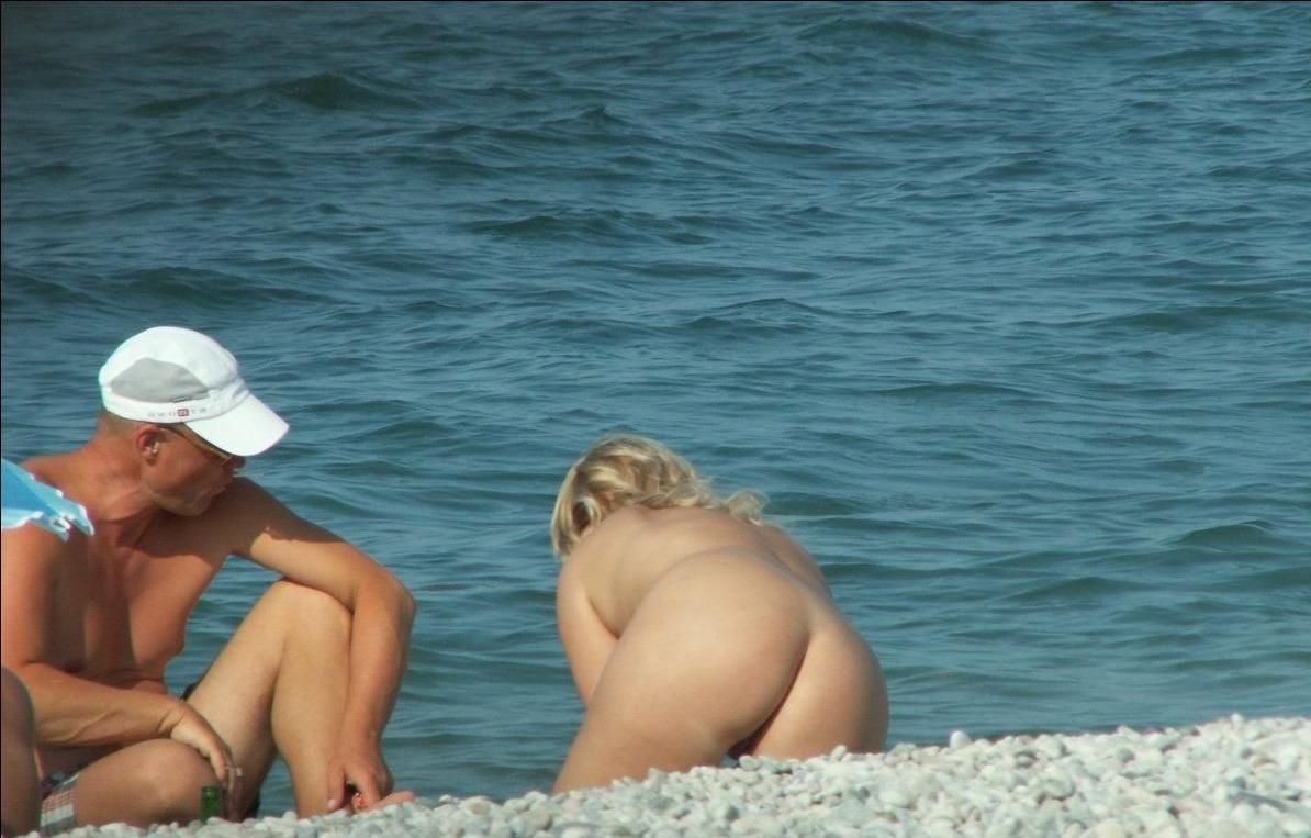 15P Nudist teen friends frolic around at a nude beach