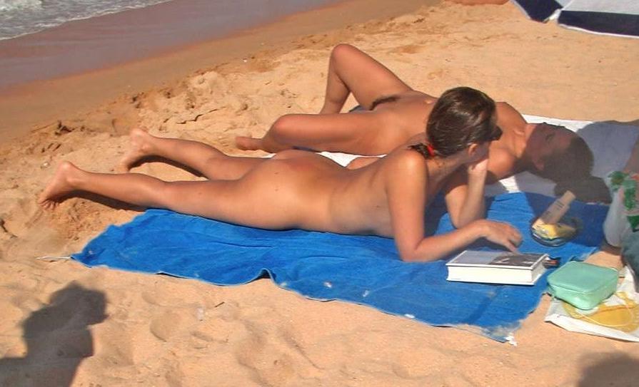 15P At the nudist beach teen girls play around naked