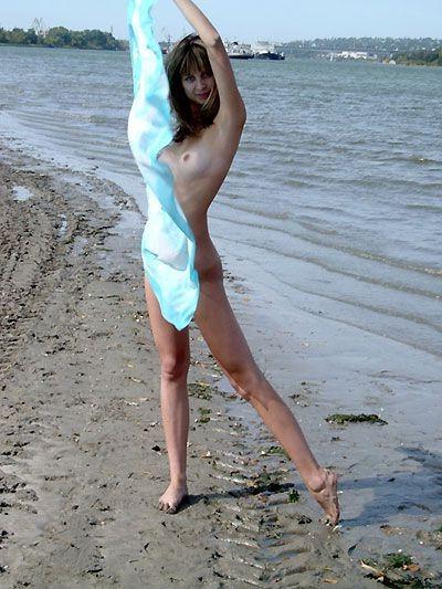 15P At the nudist beach teen girls play around naked