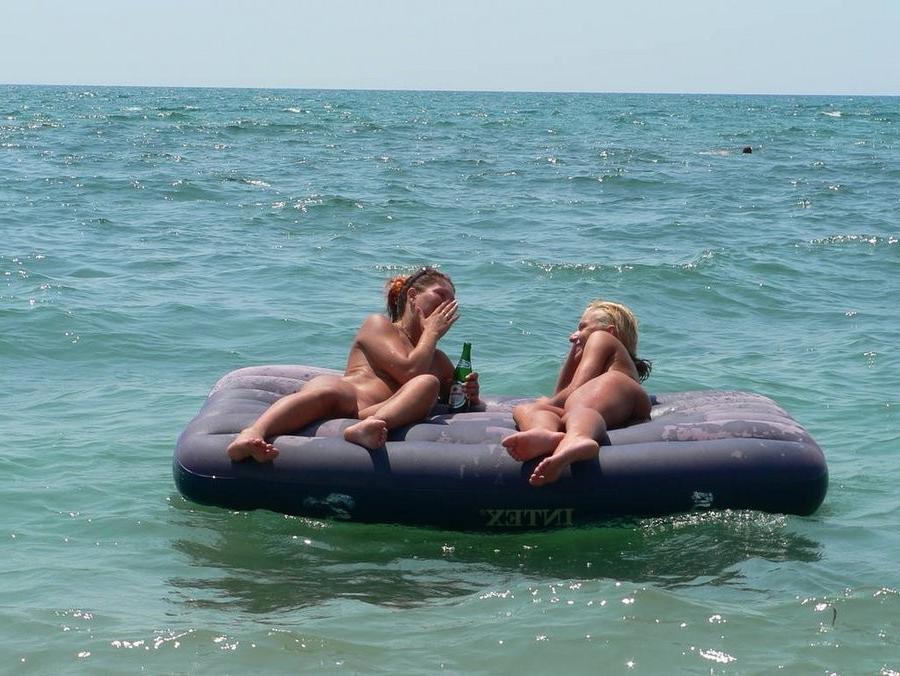 15P Nudist girls have fun with each other at the beach