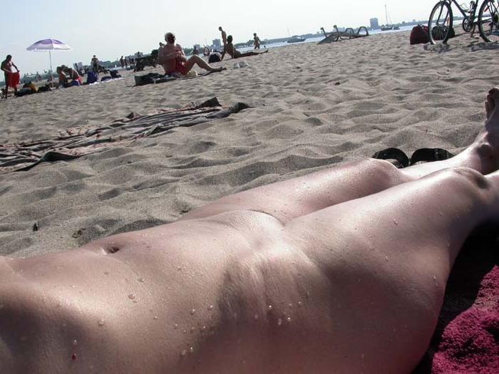 15P Blonde has some fun being nude on a public beach