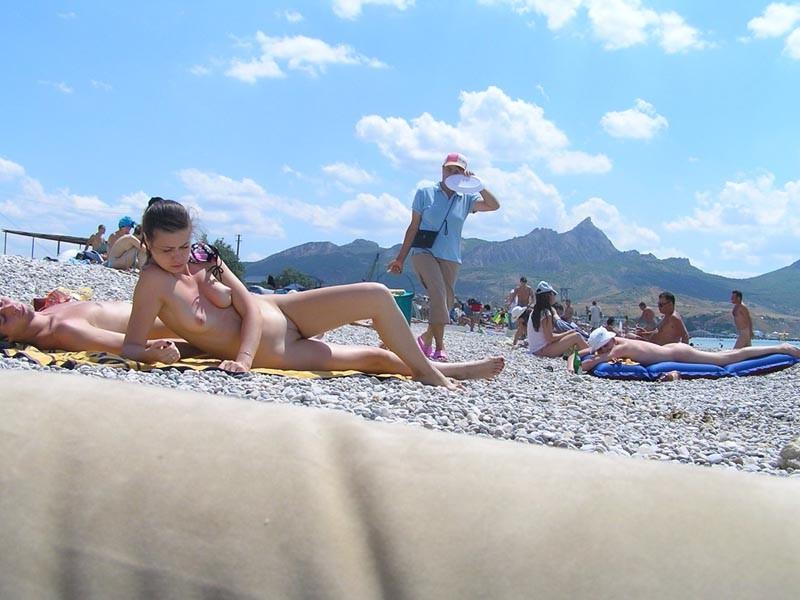 15P Blonde has some fun being nude on a public beach
