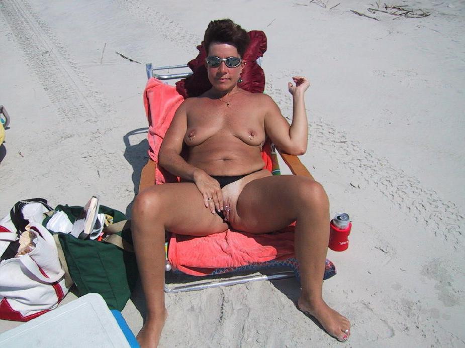 15P Blonde has some fun being nude on a public beach