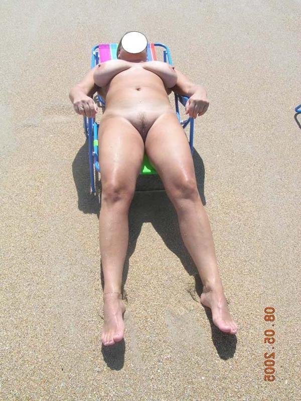 15P Blonde has some fun being nude on a public beach