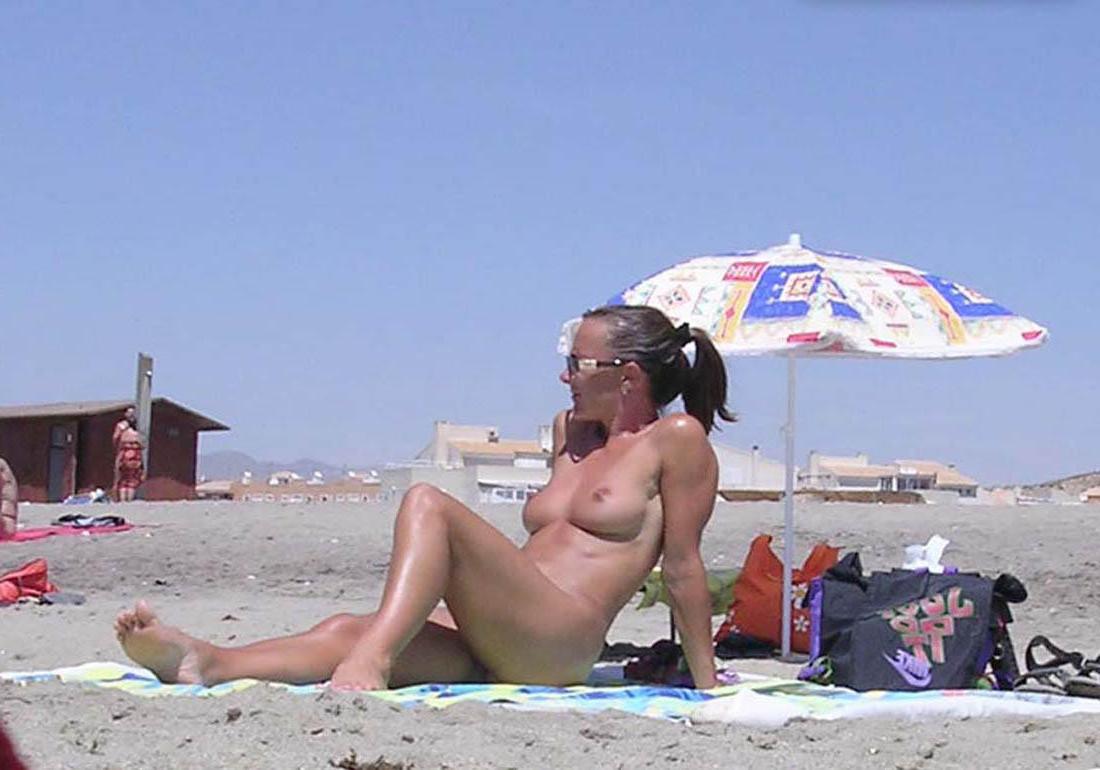 15P Blonde amazes the nude beach with her sexy body