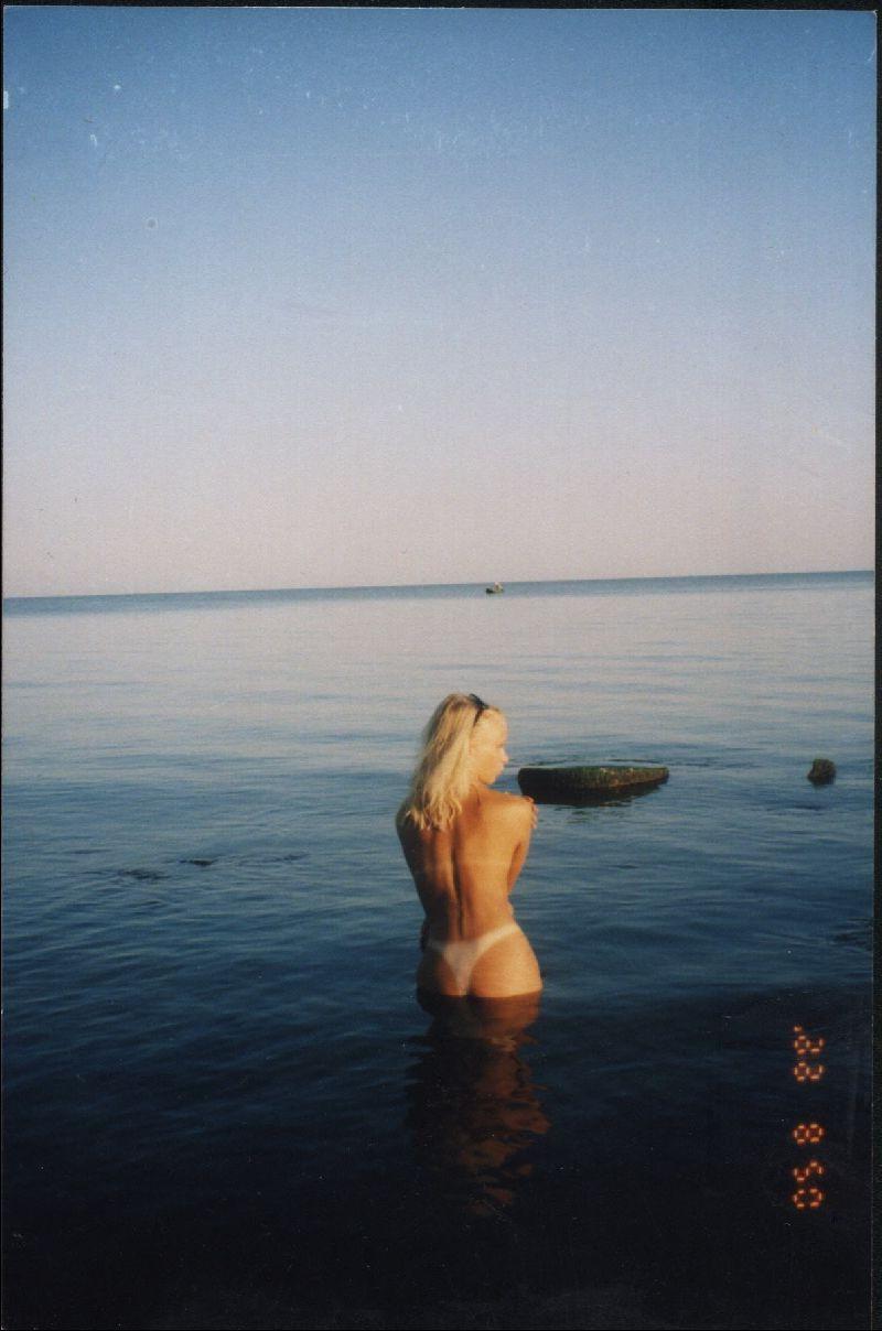 15P Nudist teen friends frolic around at a nude beach