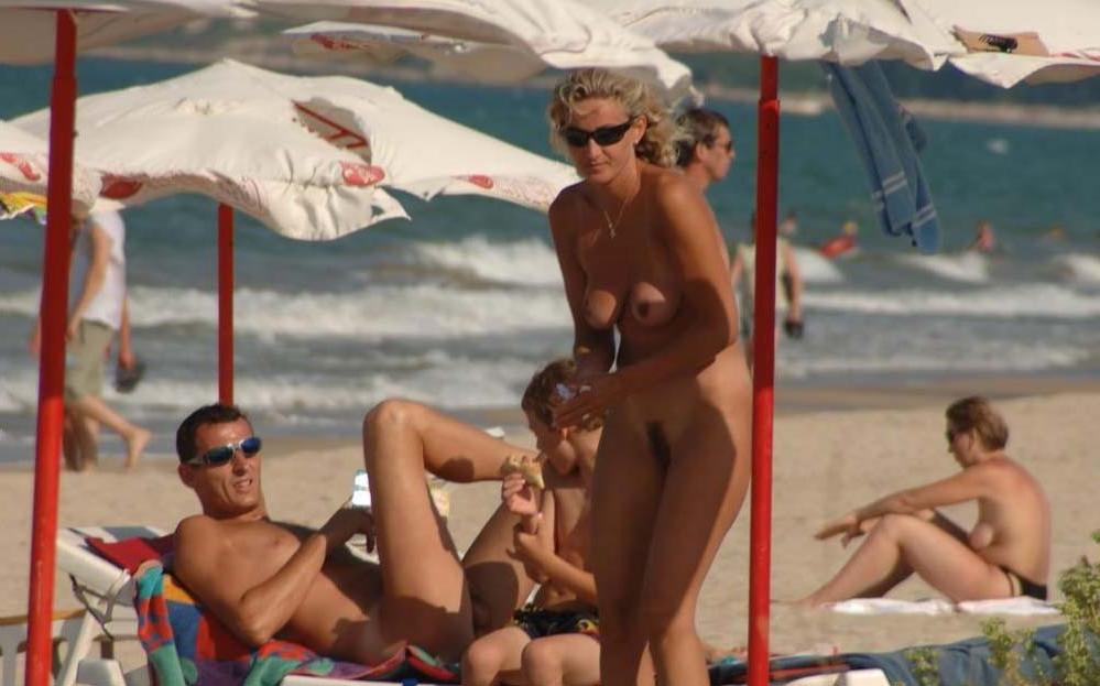 15P Nudist teen friends frolic around at a nude beach