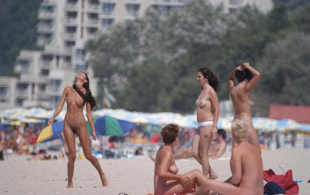 15P Nudist teen friends frolic around at a nude beach