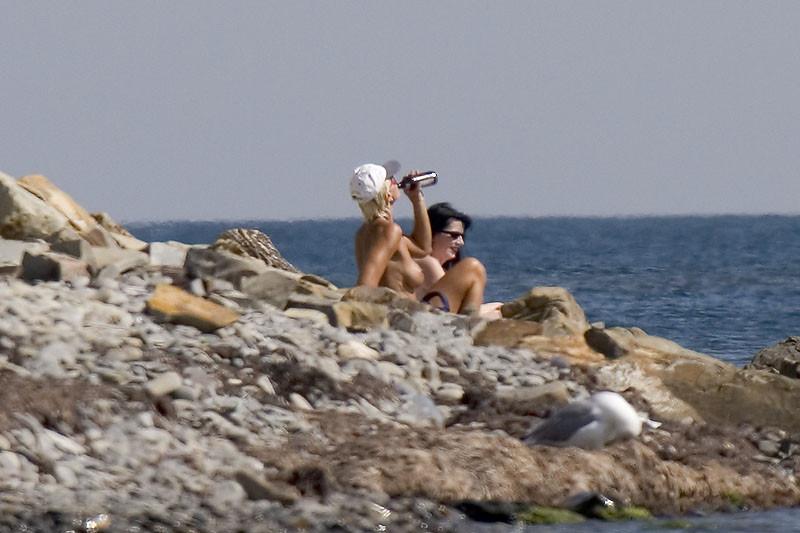 15P Nudist girls have fun with each other at the beach