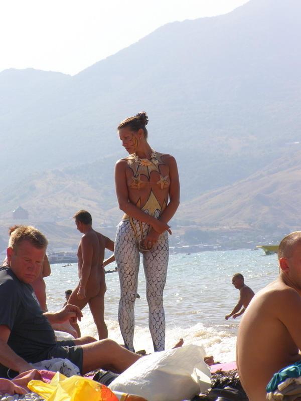 15P Nudist teen not shy about posing nude at the beach