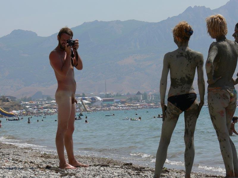 15P Sexy curvaceous cutie strips at a nudist beach
