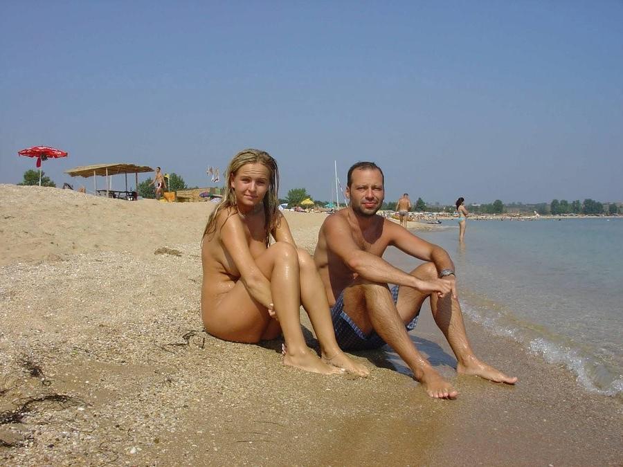 15P At the nudist beach teen girls play around naked